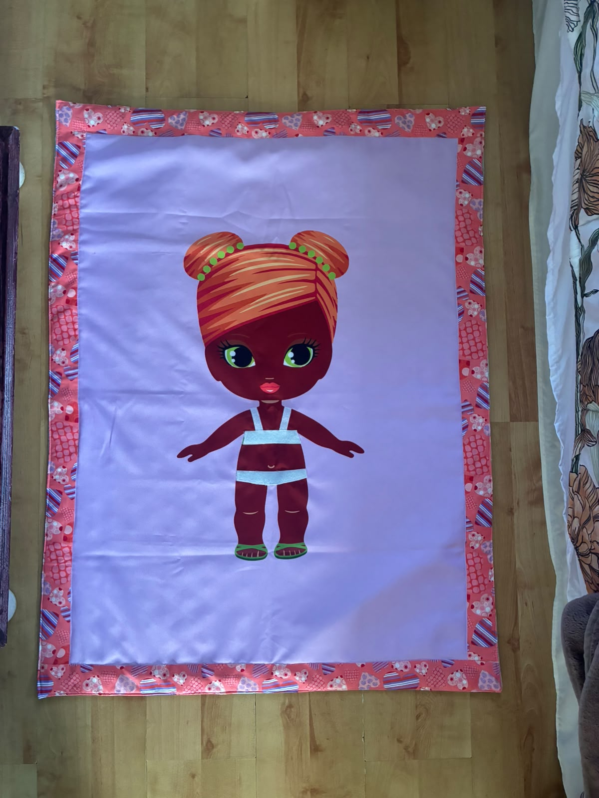 Dress-up doll blanket with pink heart trim